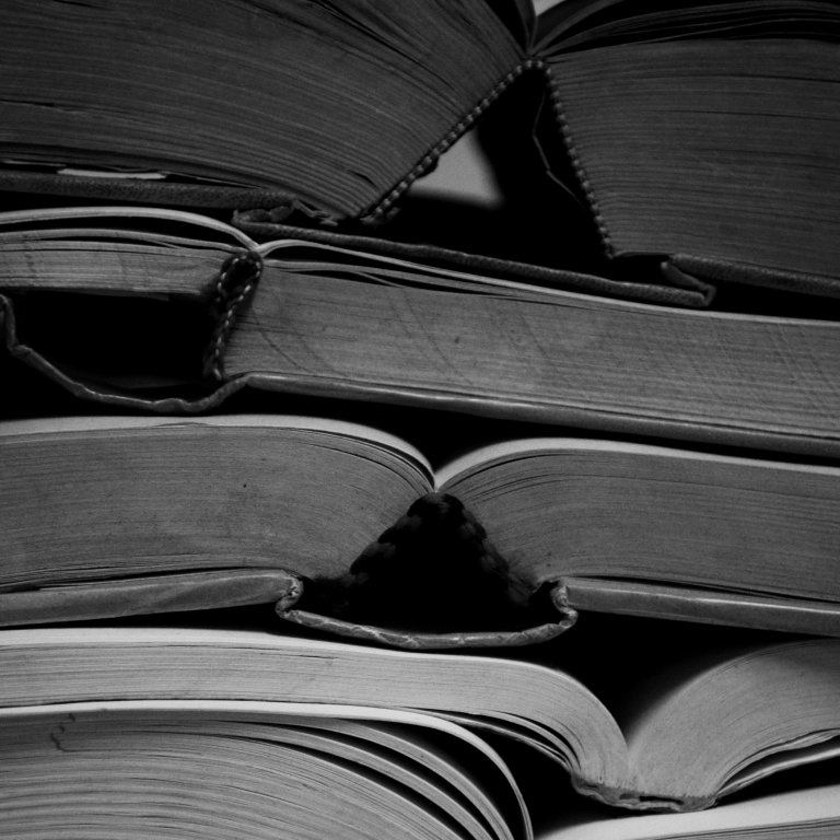 Stack of open books